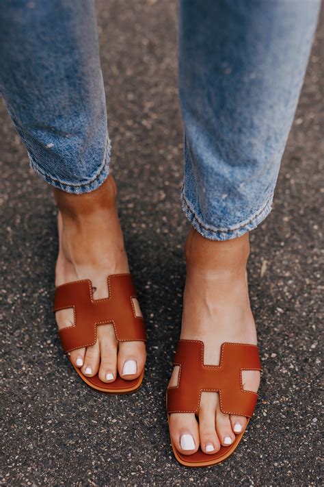 breaking in hermes oran sandals|women wearing Hermes oran sandals.